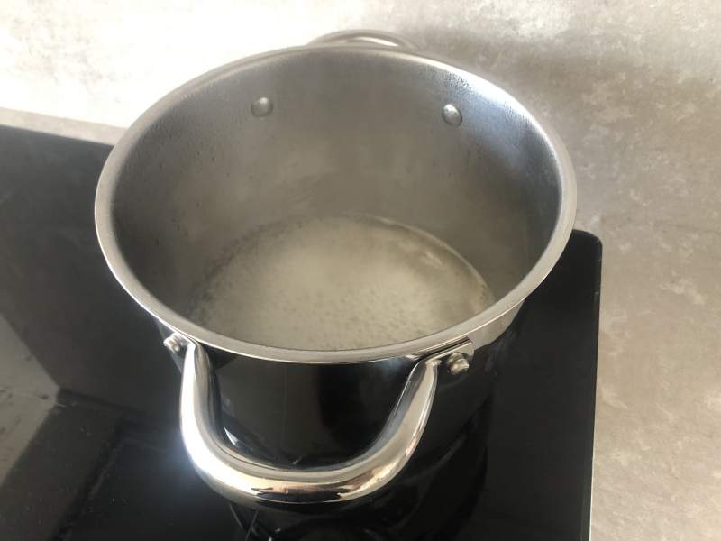 Boiling water in stainless steel pot