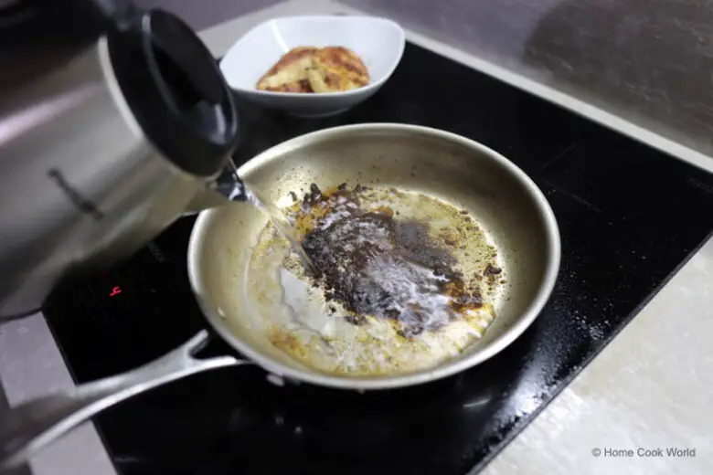 Making pan sauce by deglazing a stainless steel skillet