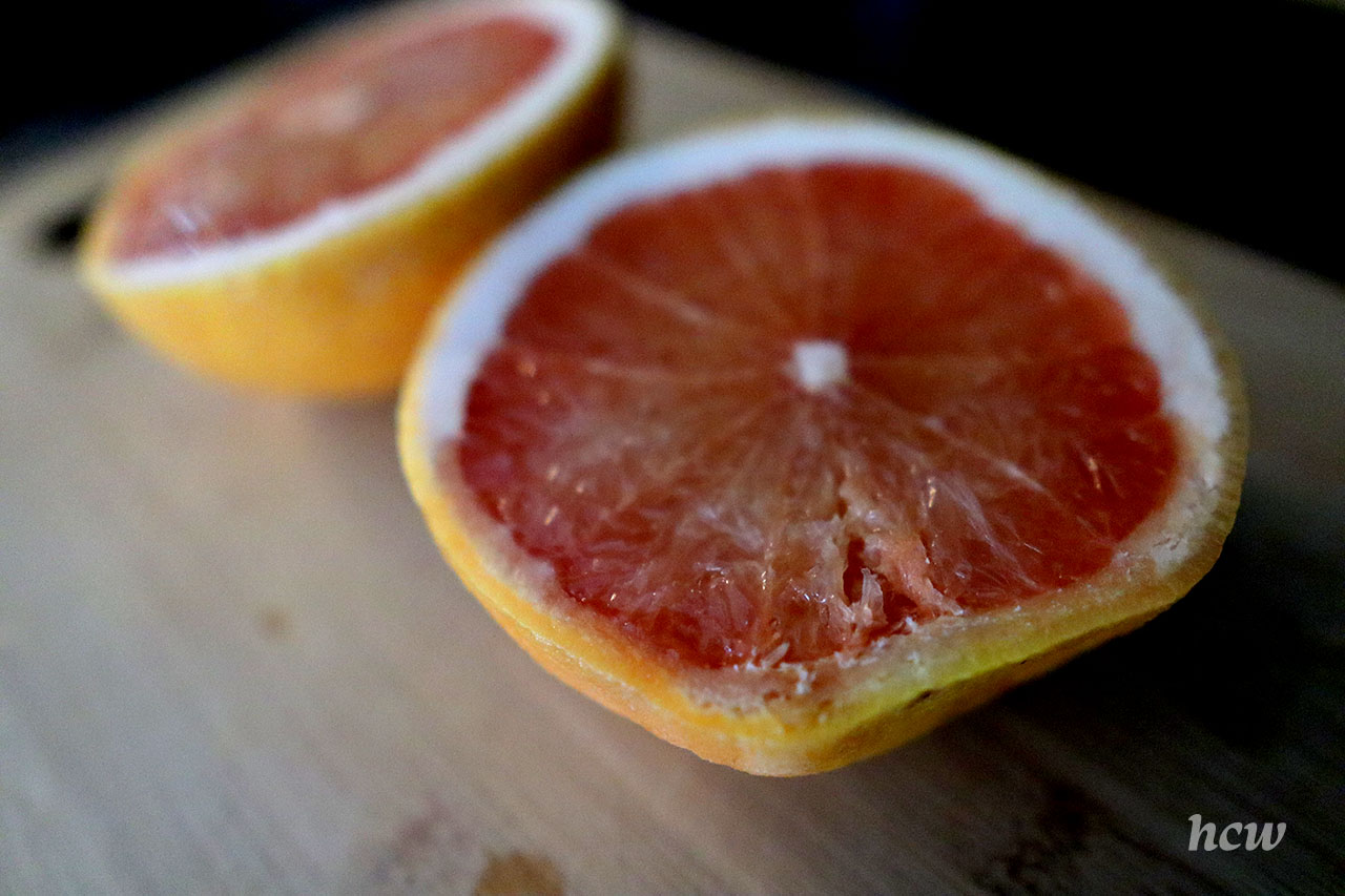 A photo of the flesh of a spoiled grapefruit.