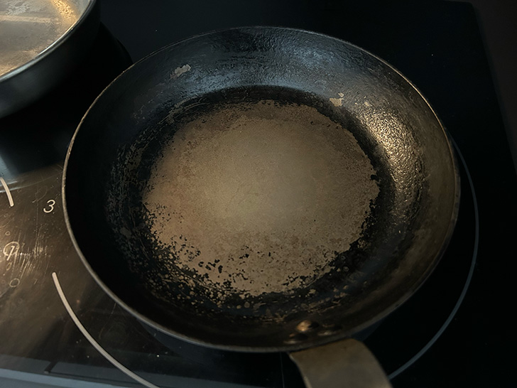 Properly seasoned carbon steel pan